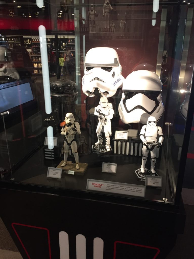 Replica helmets and statues available for purchase.